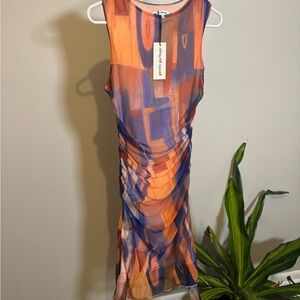 Meshki Vibrant Backless Dress